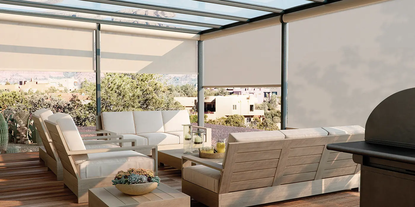 exterior solar shades installed on a patio to block sun and heat